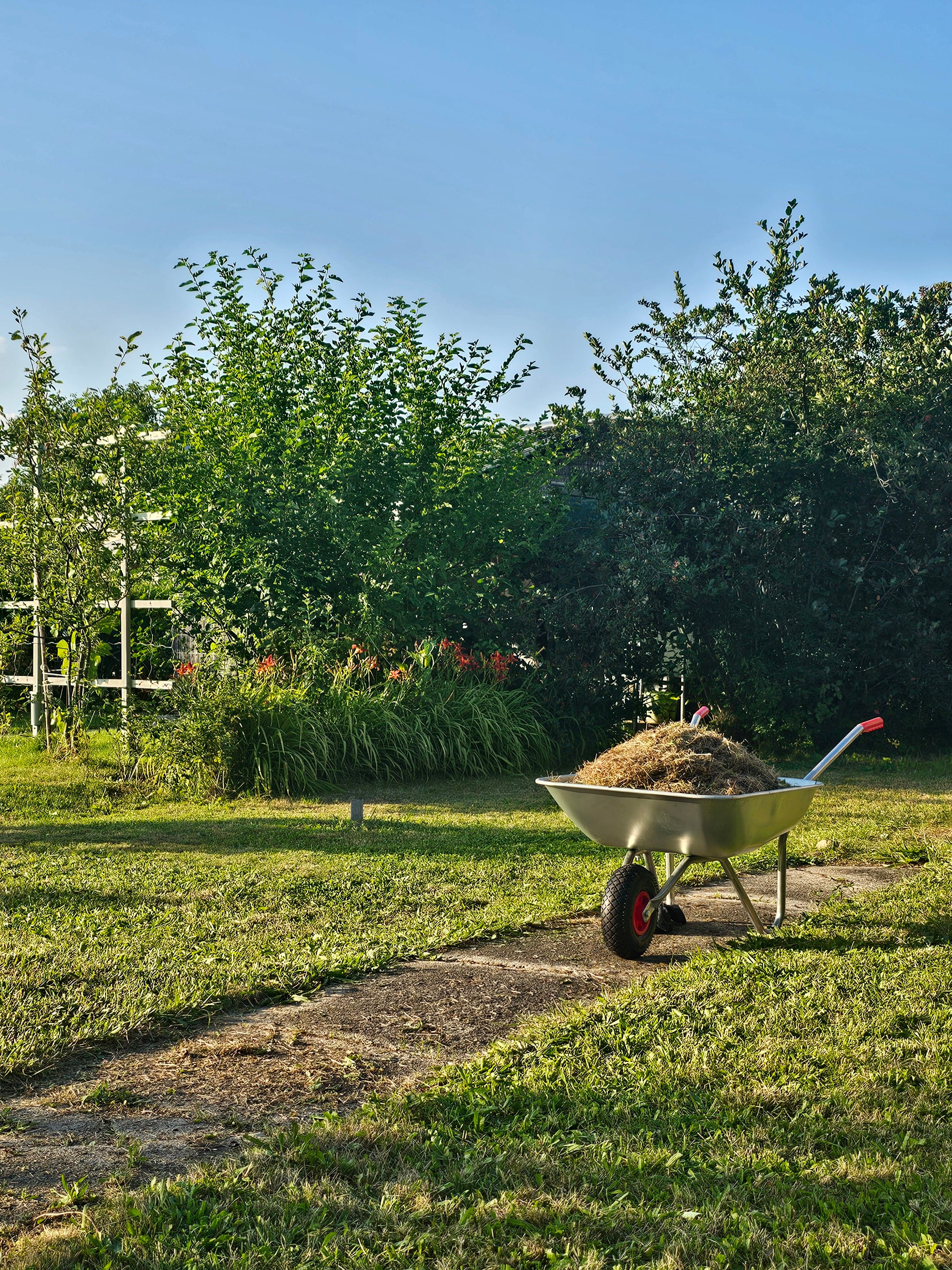 Team member loading equipment at a job site